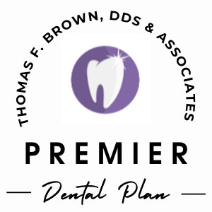 Laser Dentistry Woman with Phone Smiling by Tree