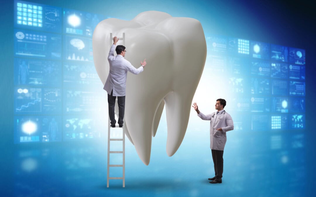 Dentists in Naperville, IL, inspecting a giant model of a tooth