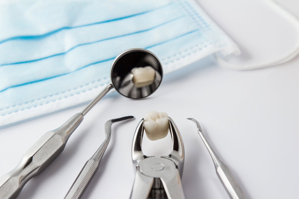 tooth extraction and tools on table