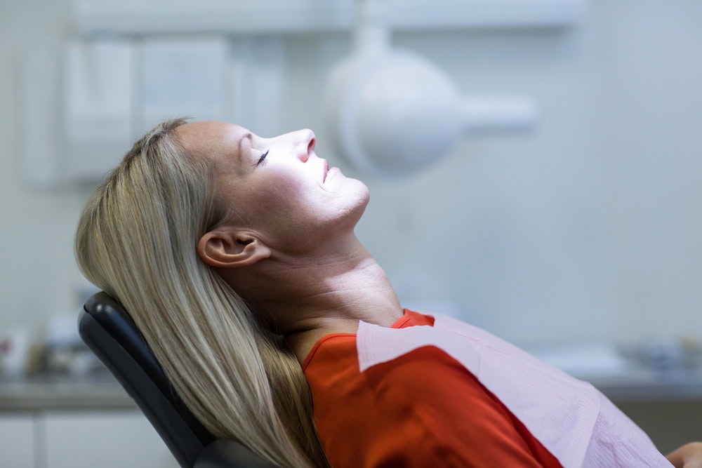 Relaxed patient resting comfortably during IV sedation